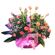 Rose symphony. Nicely decorated basket featuring pink roses and green fillers